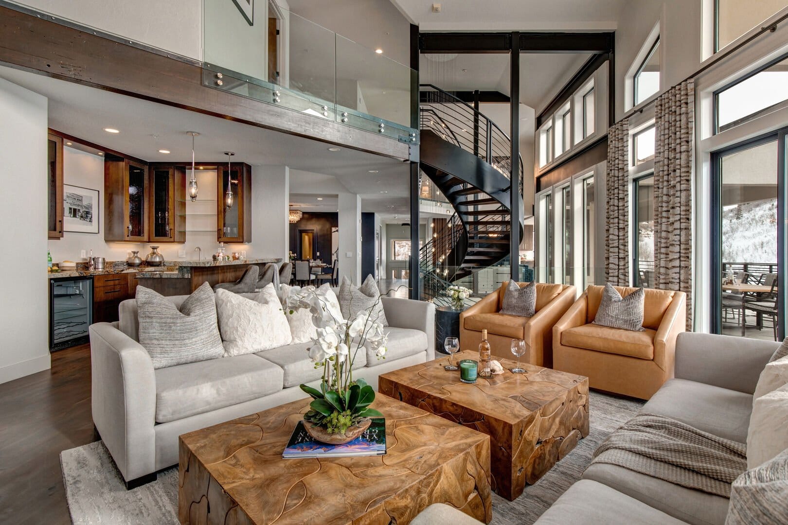 Modern living room with spiral staircase.