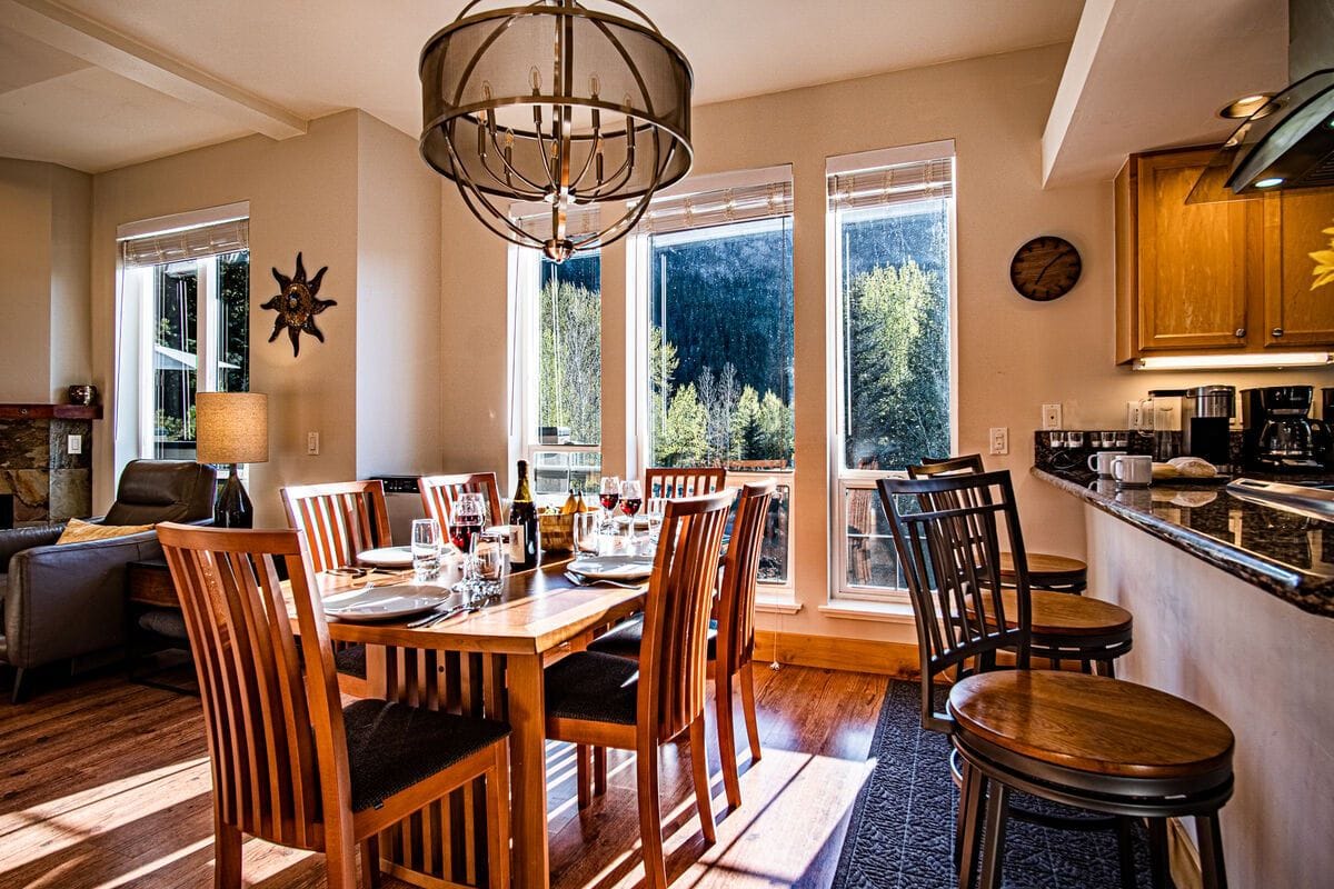 Cozy dining area with large windows.