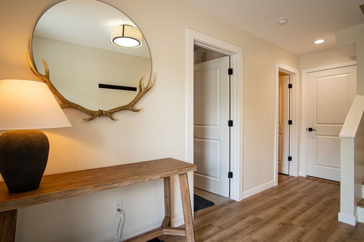 Hallway with antler mirror decor.