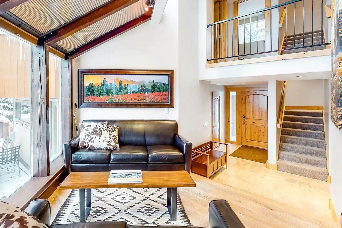 Modern living room with staircase.