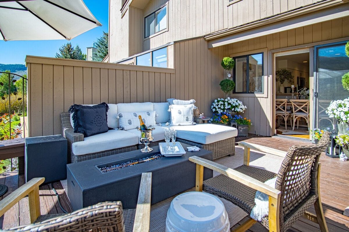 Cozy outdoor patio with seating.