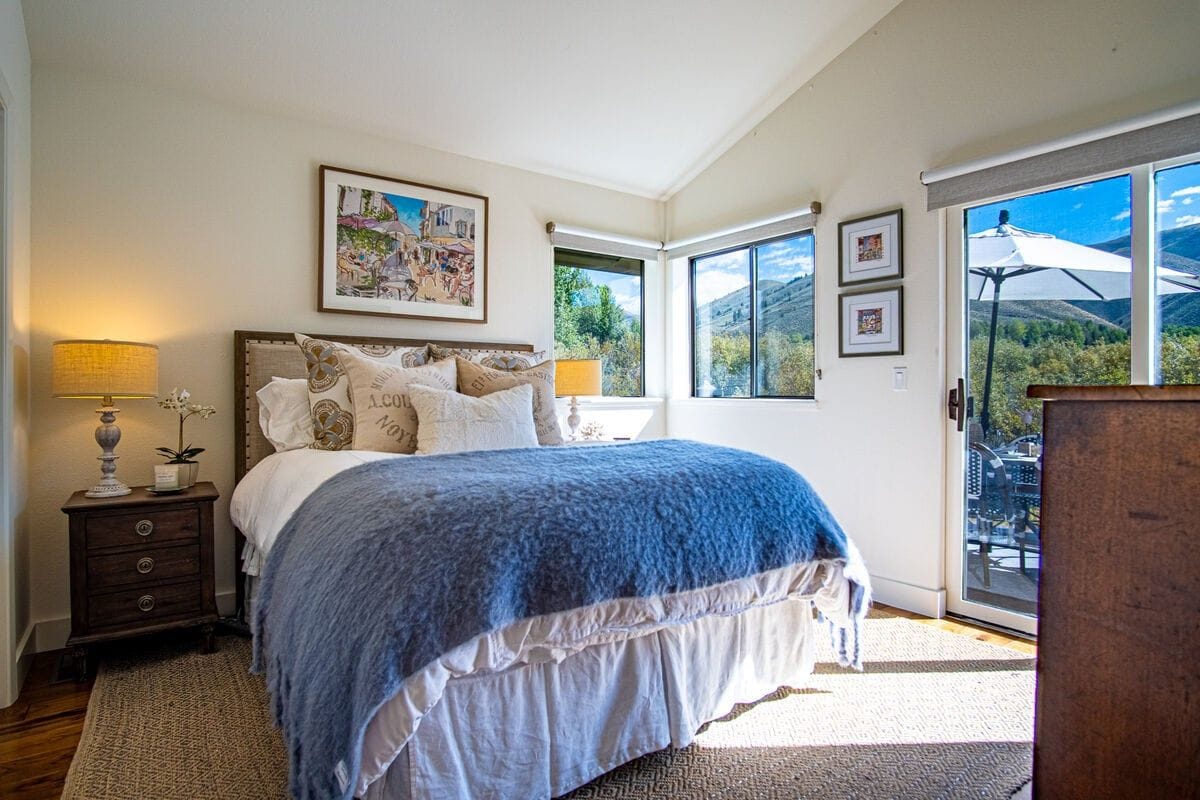 Bright bedroom with mountain views