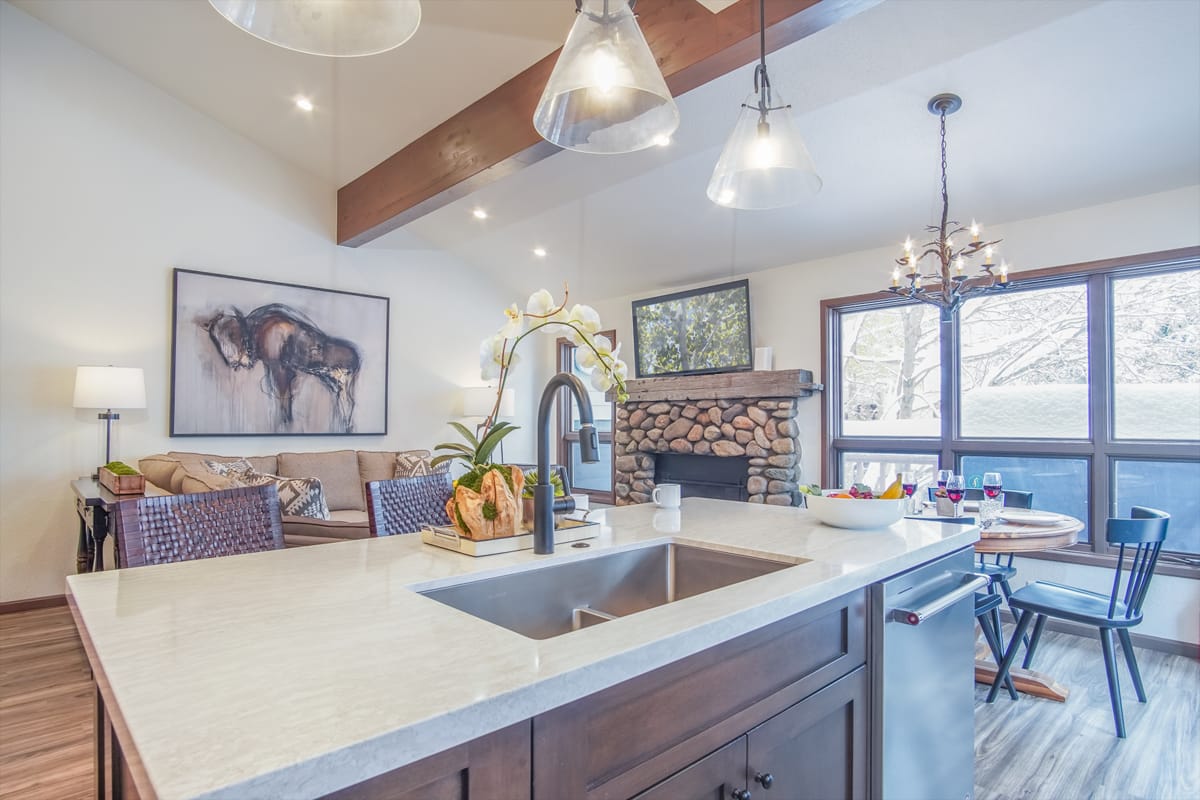 Modern kitchen and cozy living room.