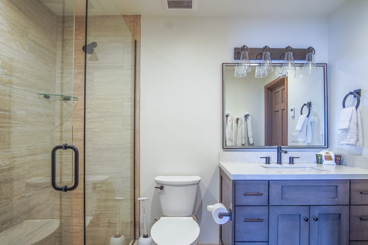 Modern bathroom with glass shower.