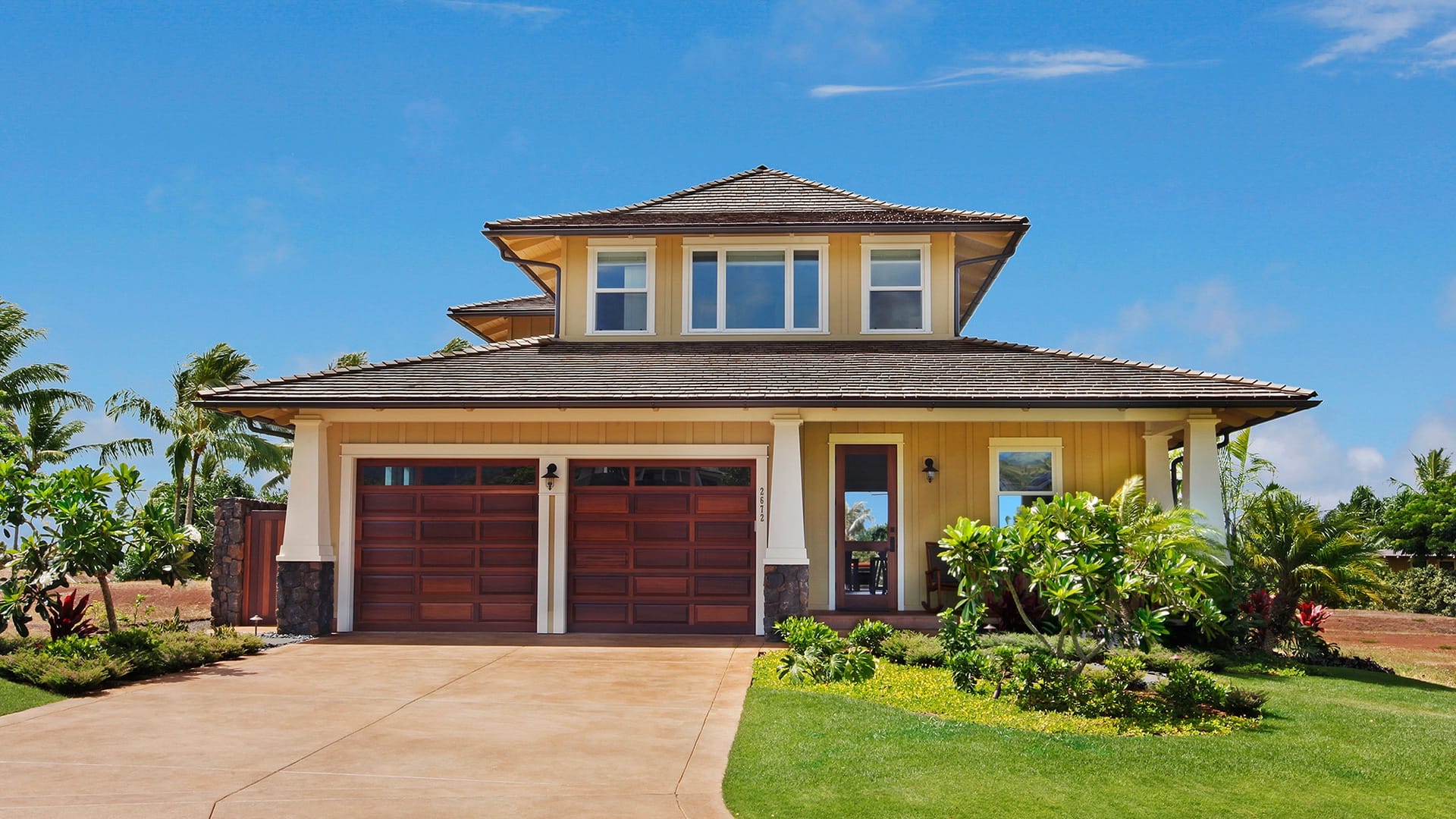 Two-story house with garage.