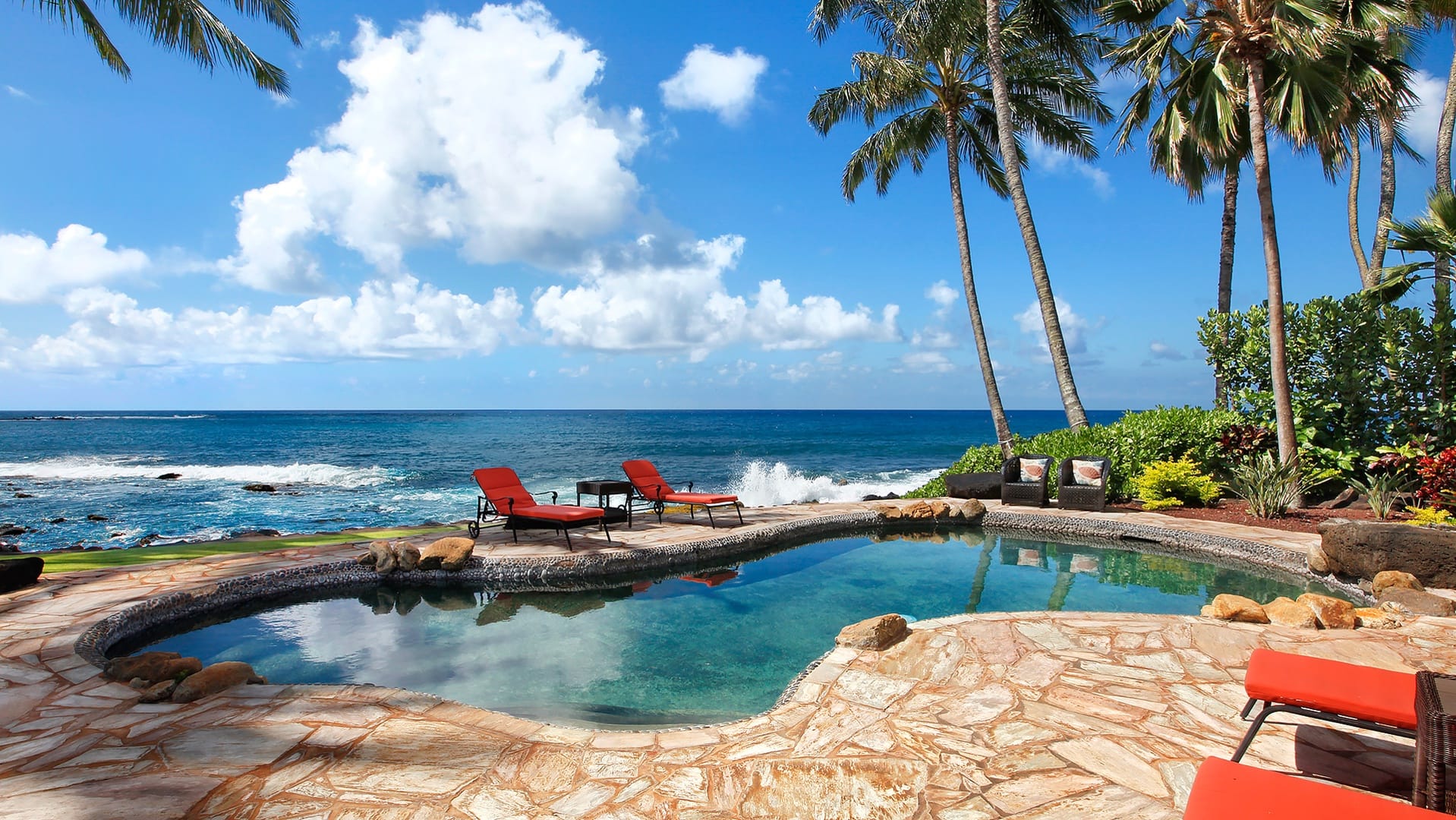 Tropical pool with ocean view.