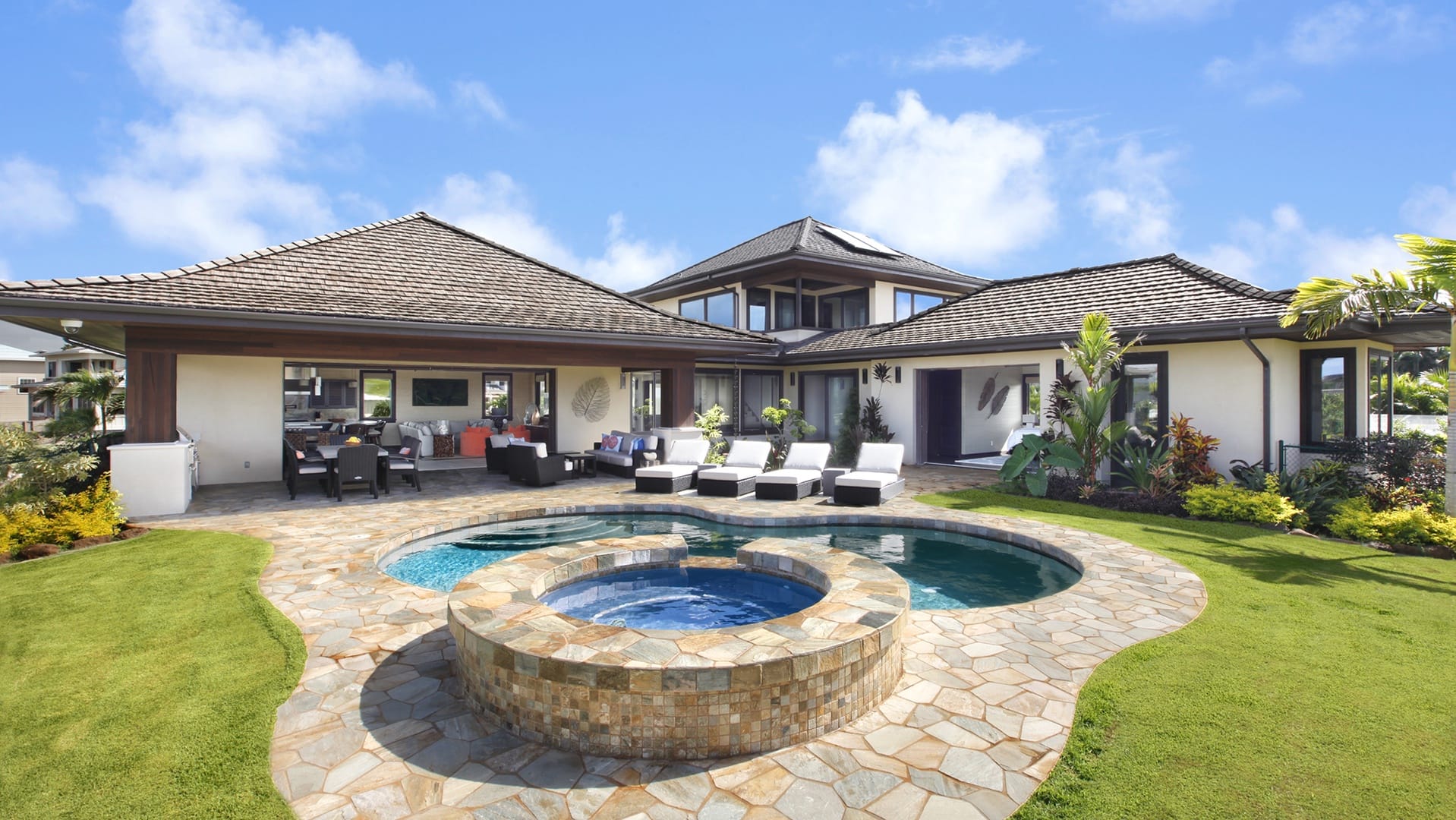 Modern house with pool and patio.