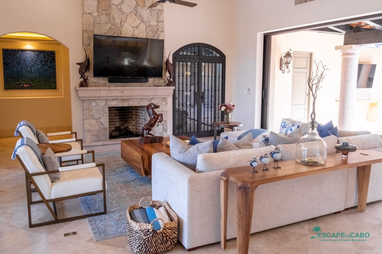 Modern living room with stone fireplace.