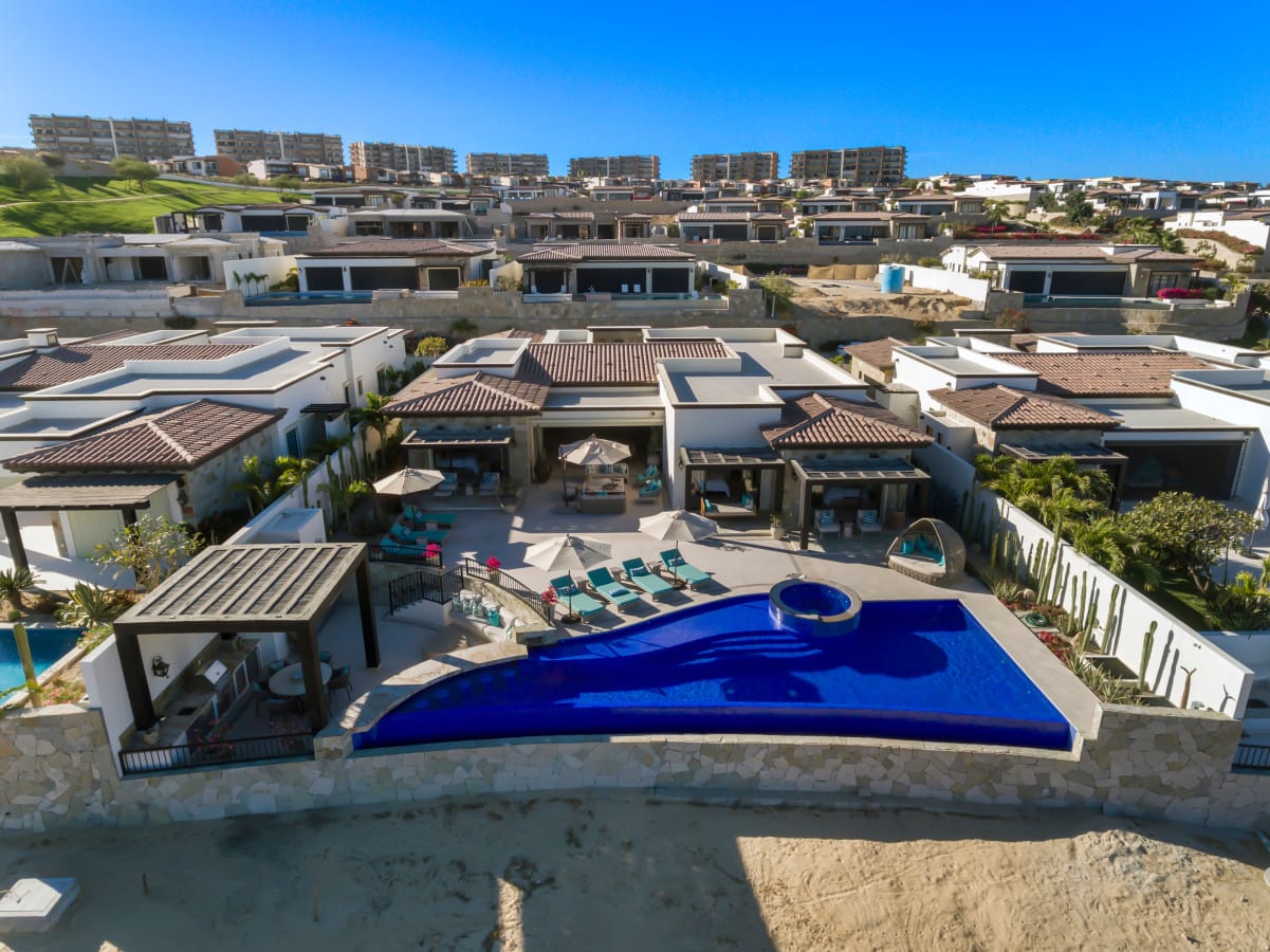 Luxury villas with pool aerial view.