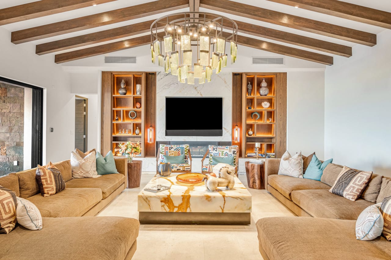 Modern living room with wooden beams.