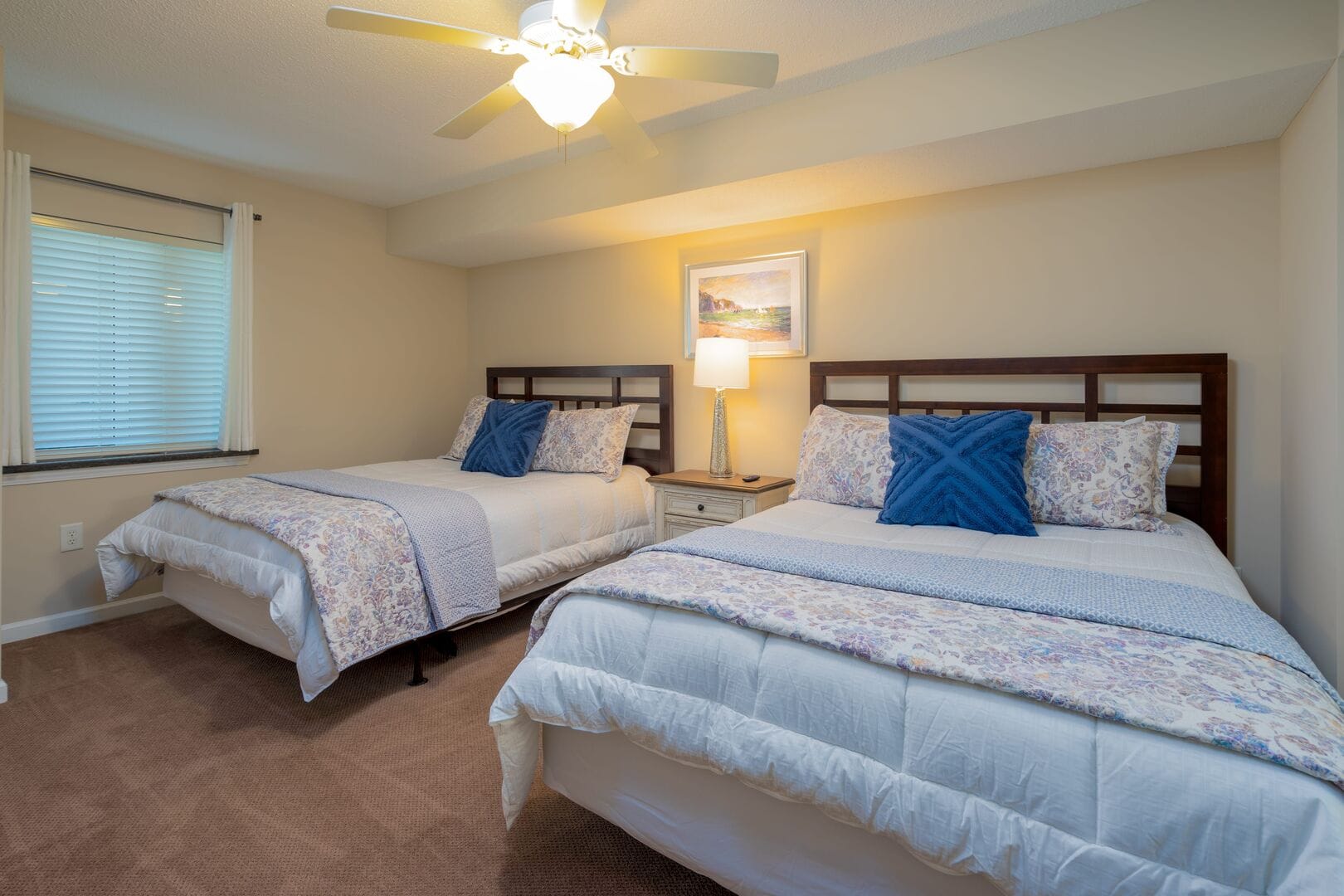 Bedroom with two double beds.