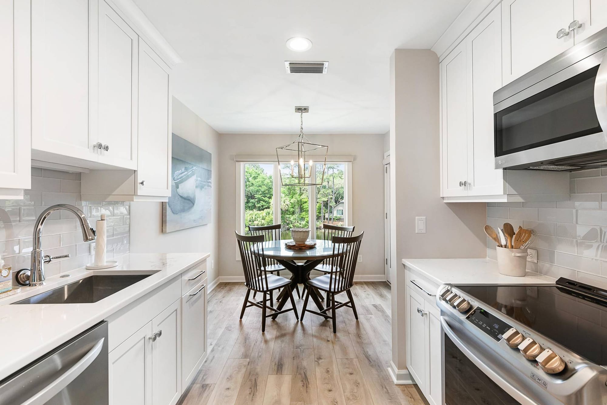 Bright kitchen with dining area.