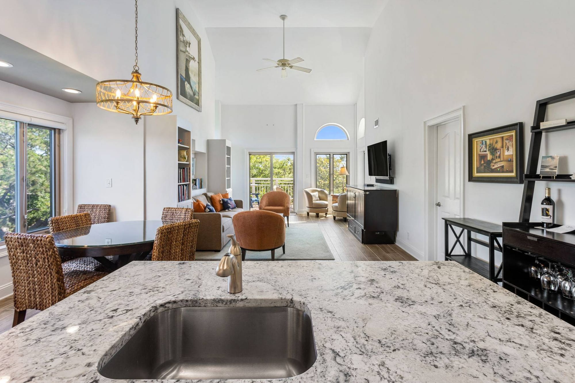 Spacious living room with kitchen view.