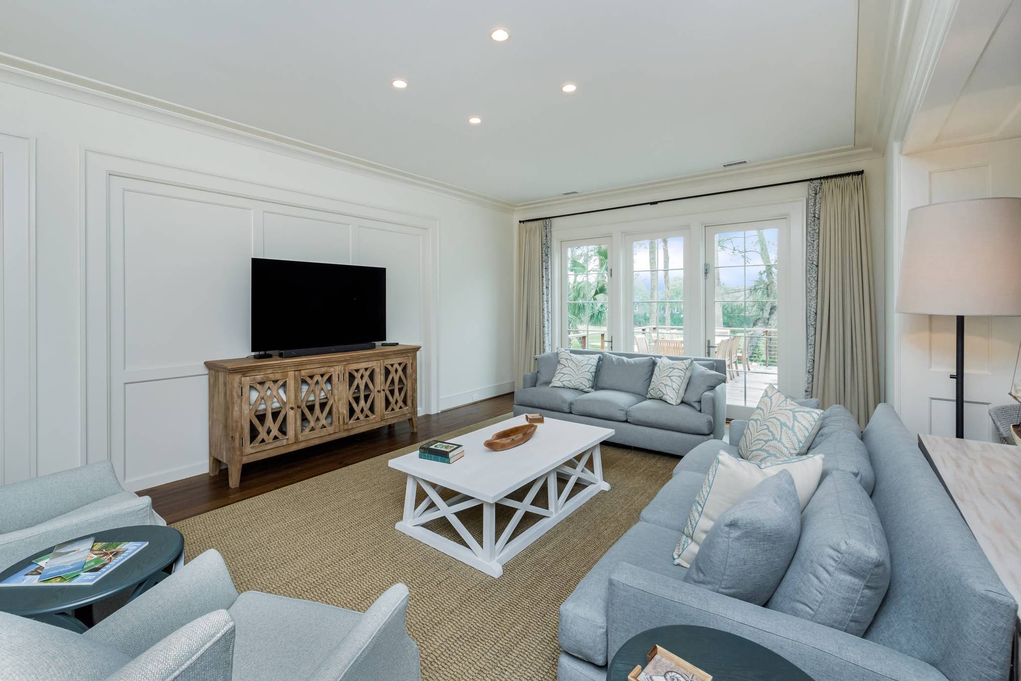 Modern living room with grey sofas.