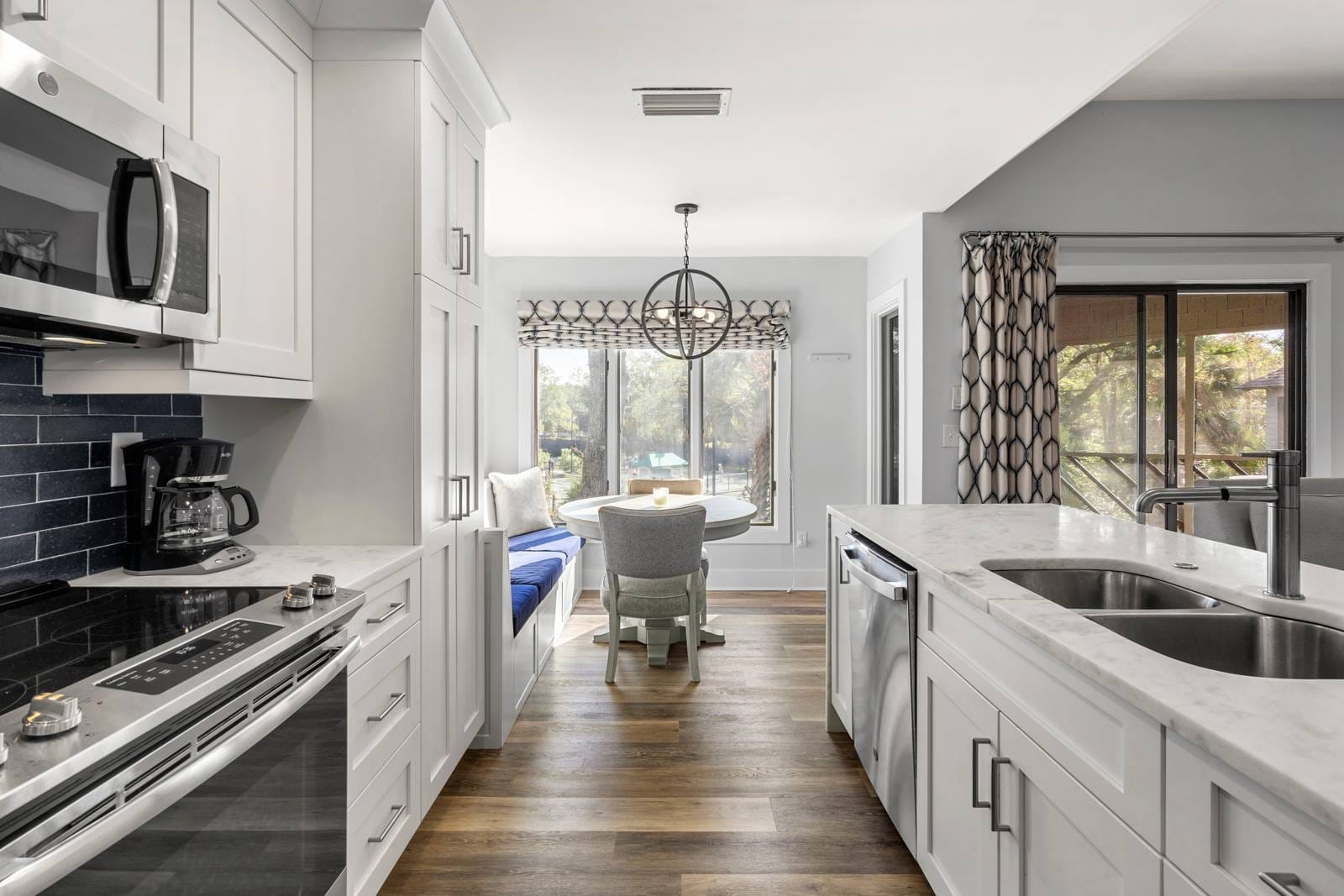 Modern kitchen with dining nook.