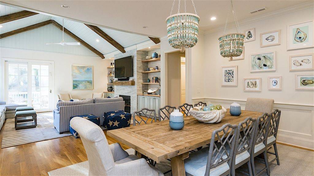 Coastal-themed living and dining area.