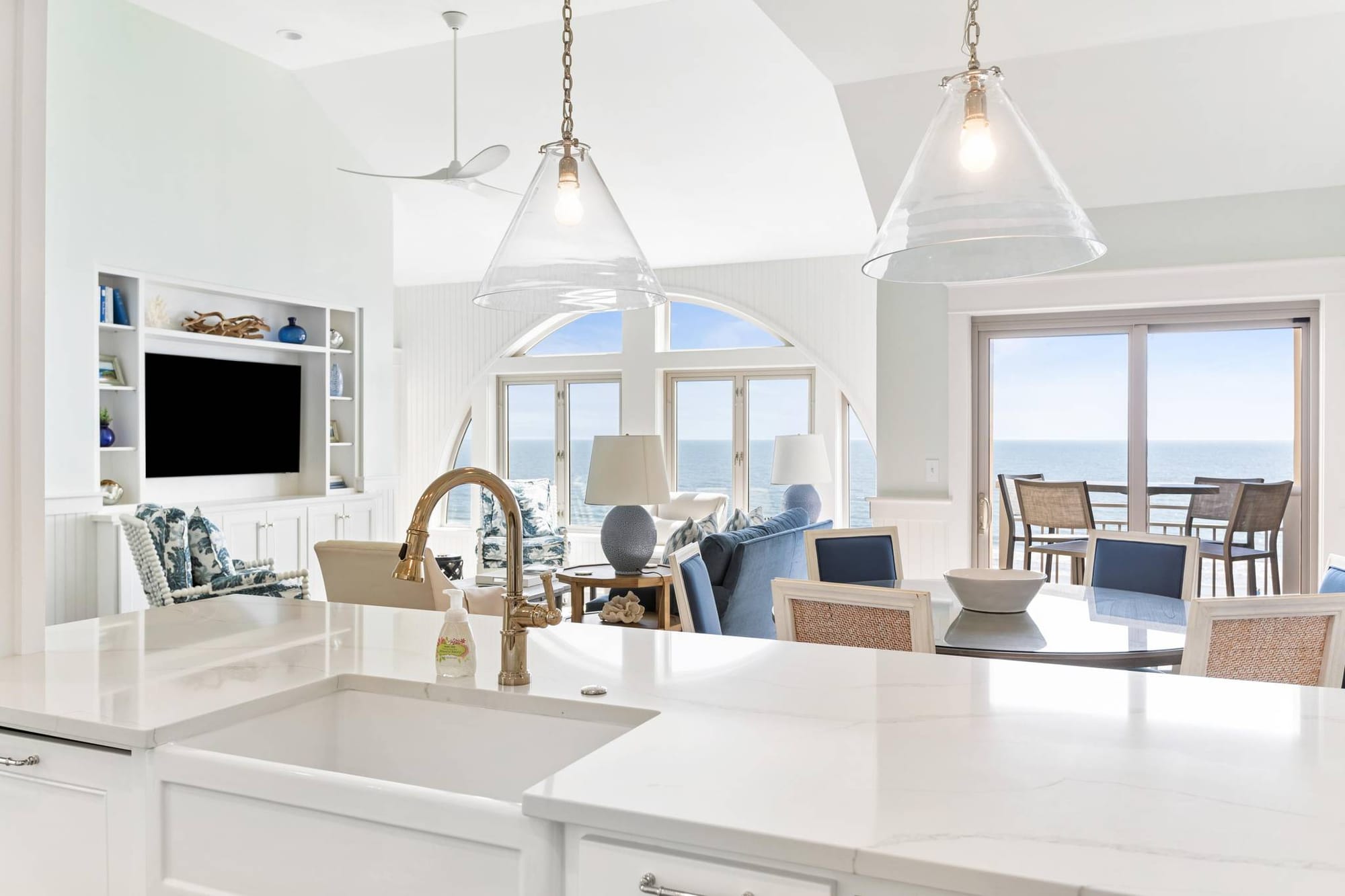 Bright kitchen and living room view.