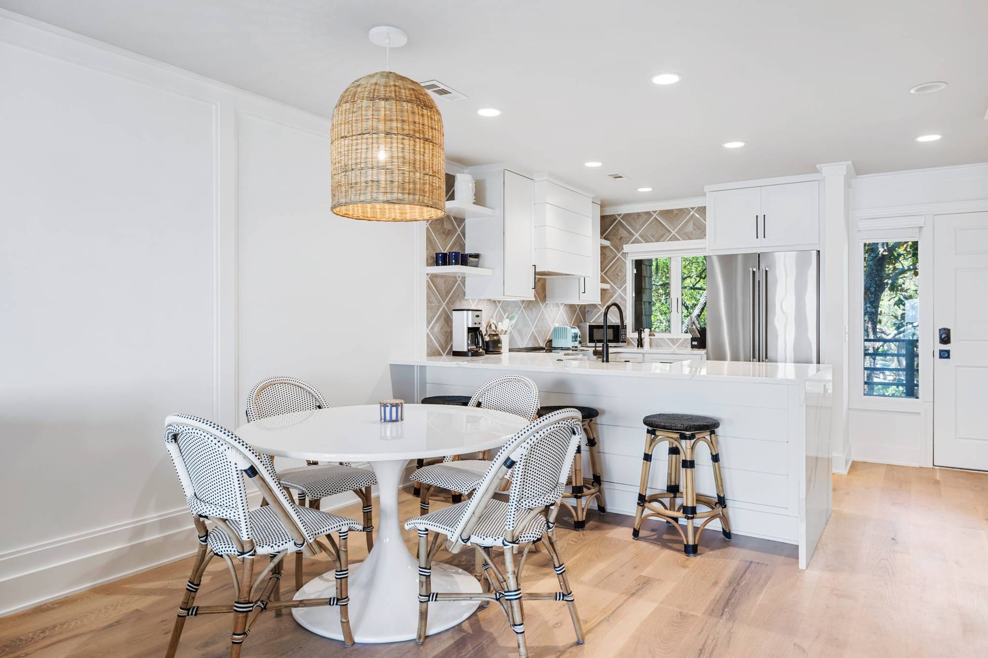 Bright kitchen with dining area.