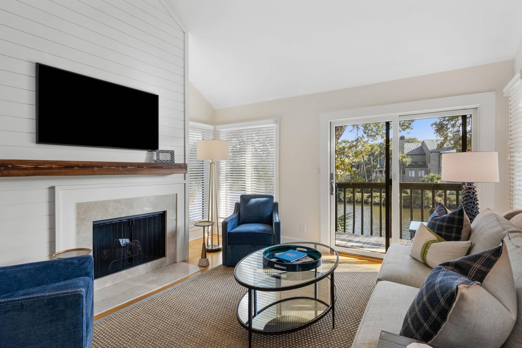 Modern living room with large window.