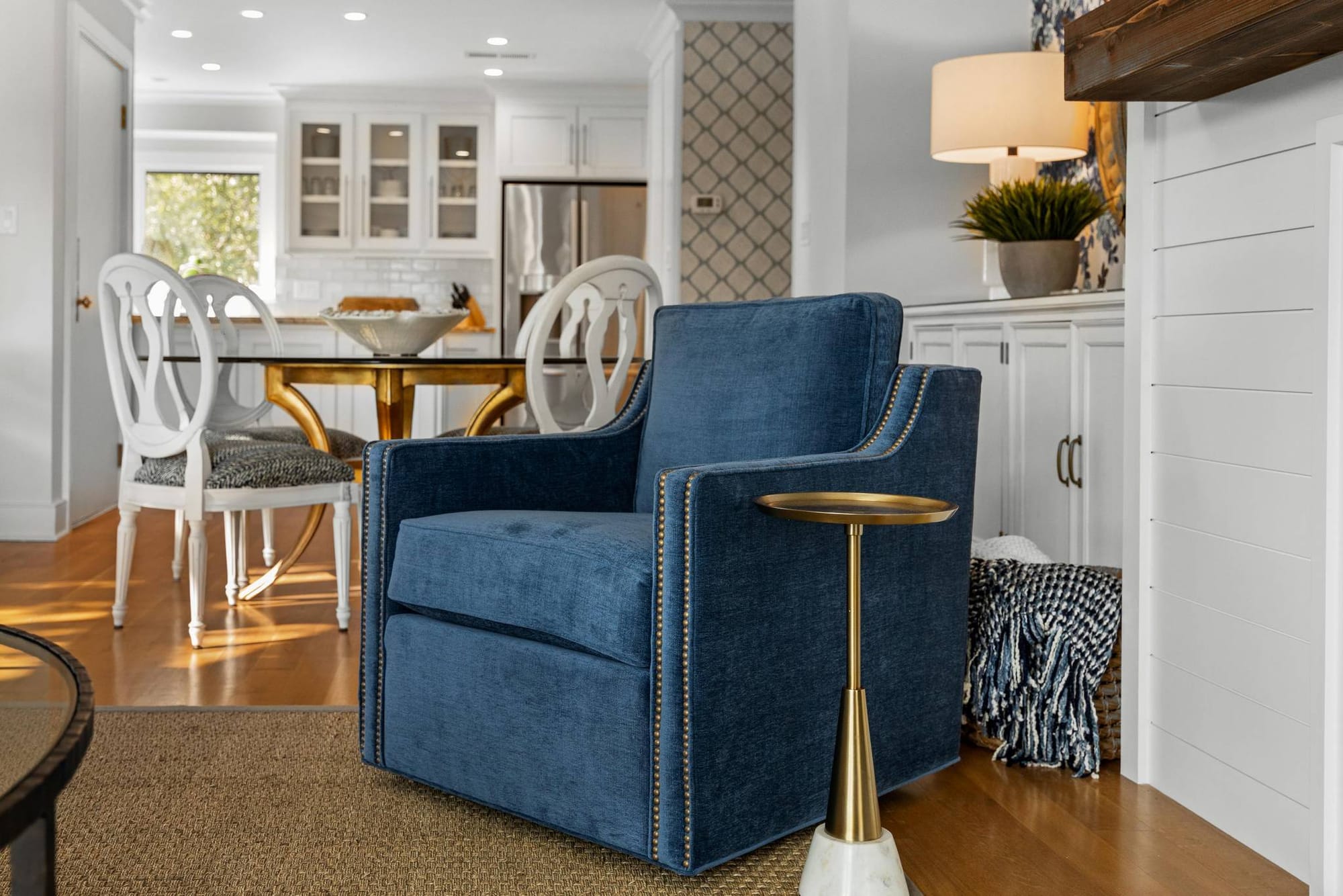 Cozy living room with blue chair.