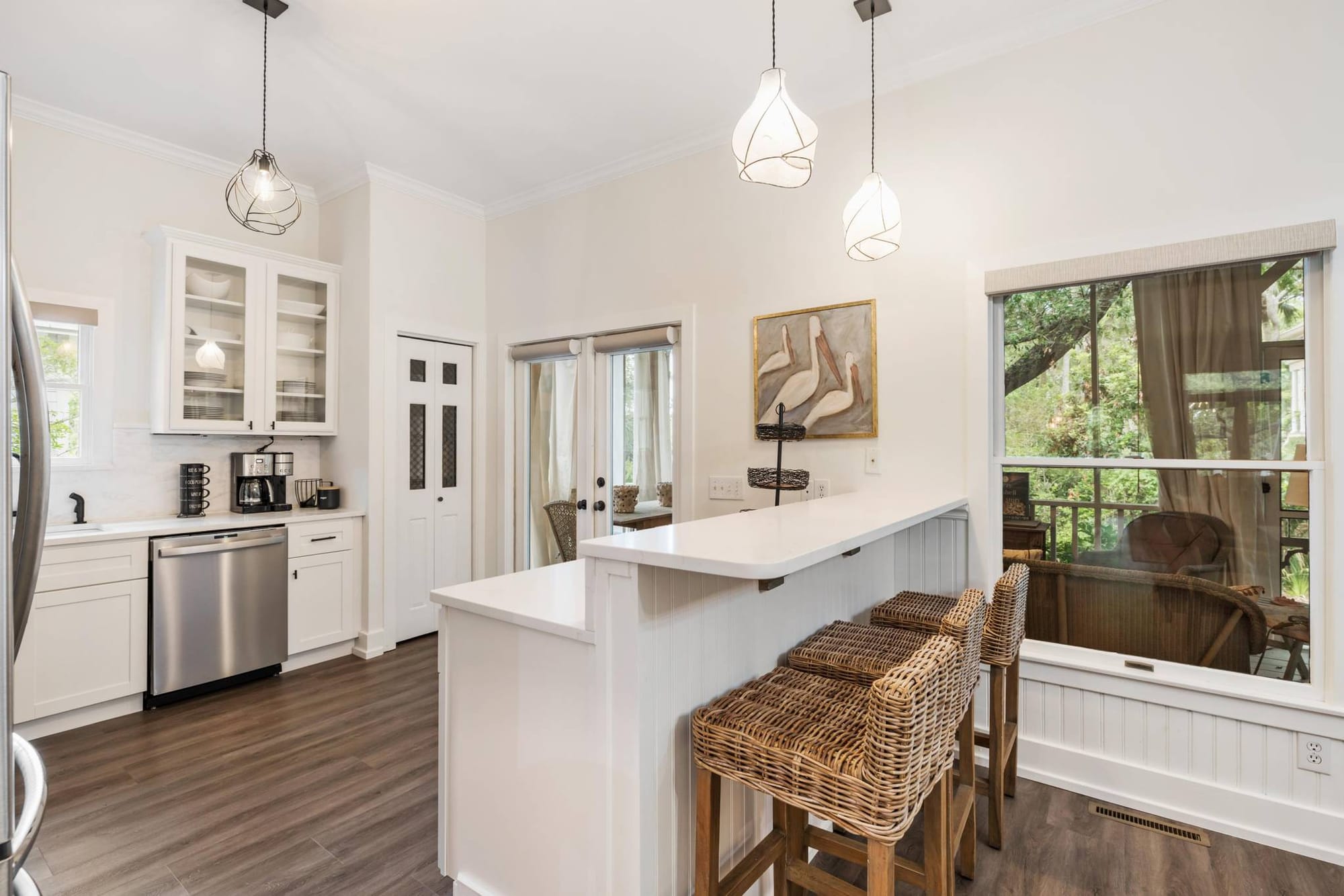 Bright kitchen with wicker stools.