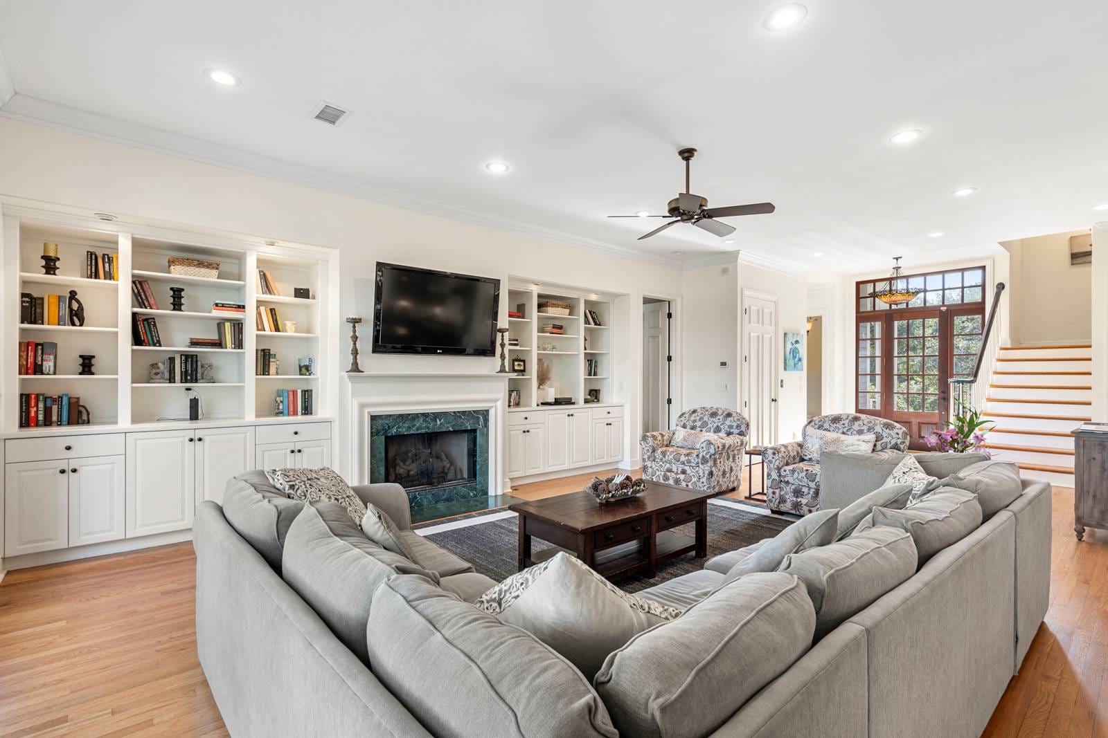 Spacious living room with fireplace.