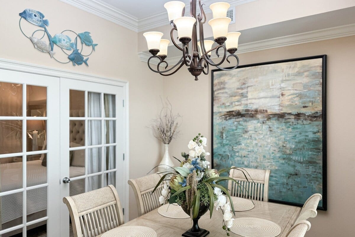 Dining room with floral centerpiece.