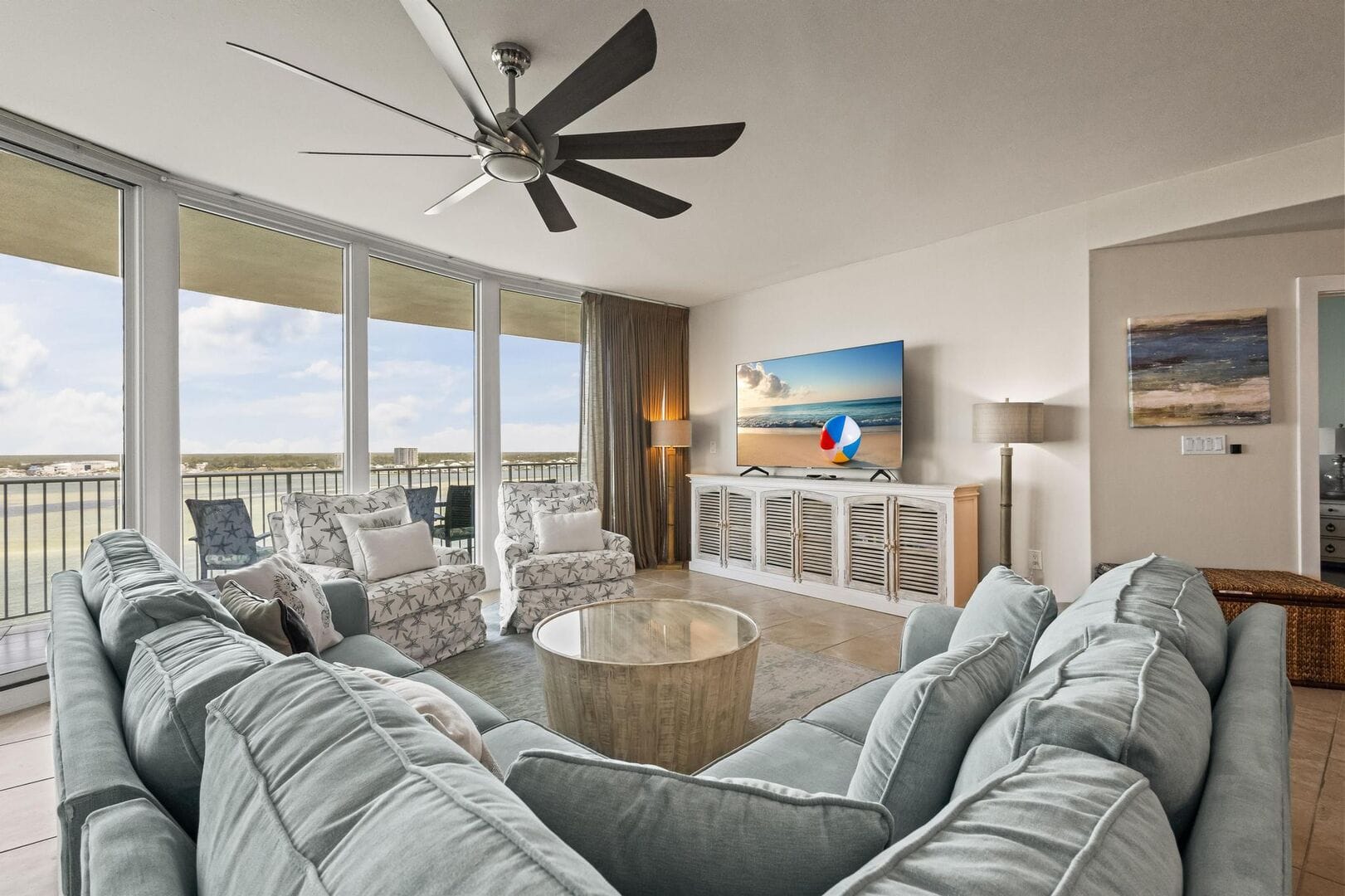 Spacious living room with balcony.