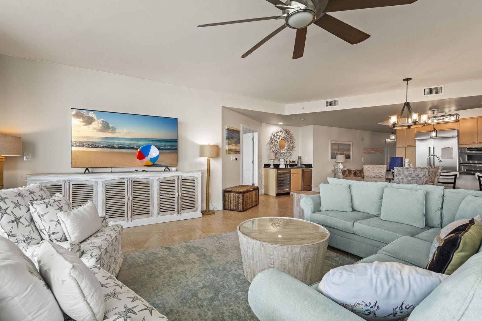 Modern living room, beach-themed decor.