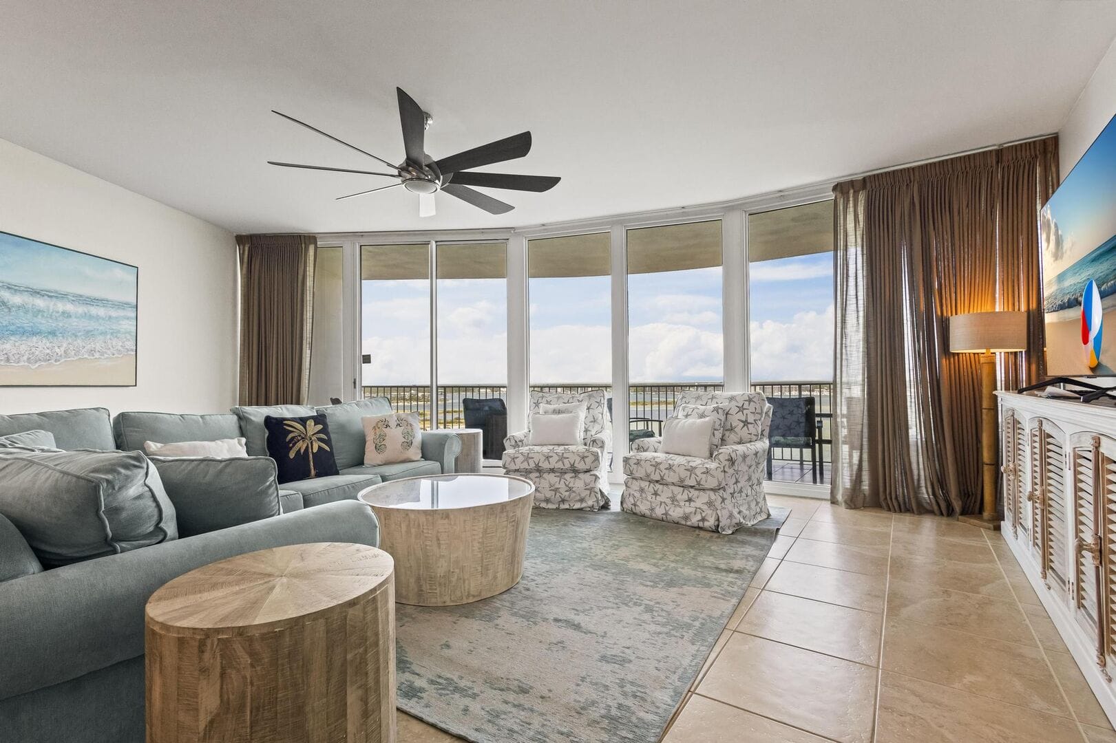 Cozy oceanview living room, large windows.