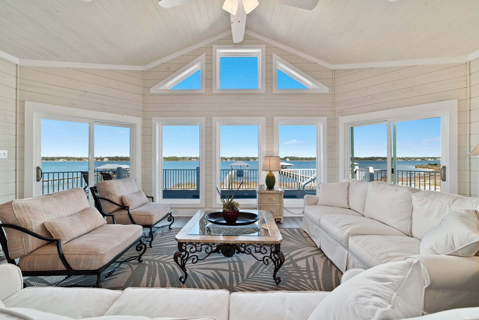 Bright living room with lake view.