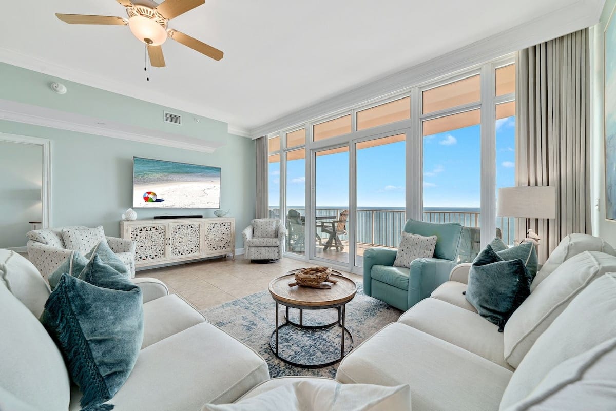 Modern ocean-view living room interior.