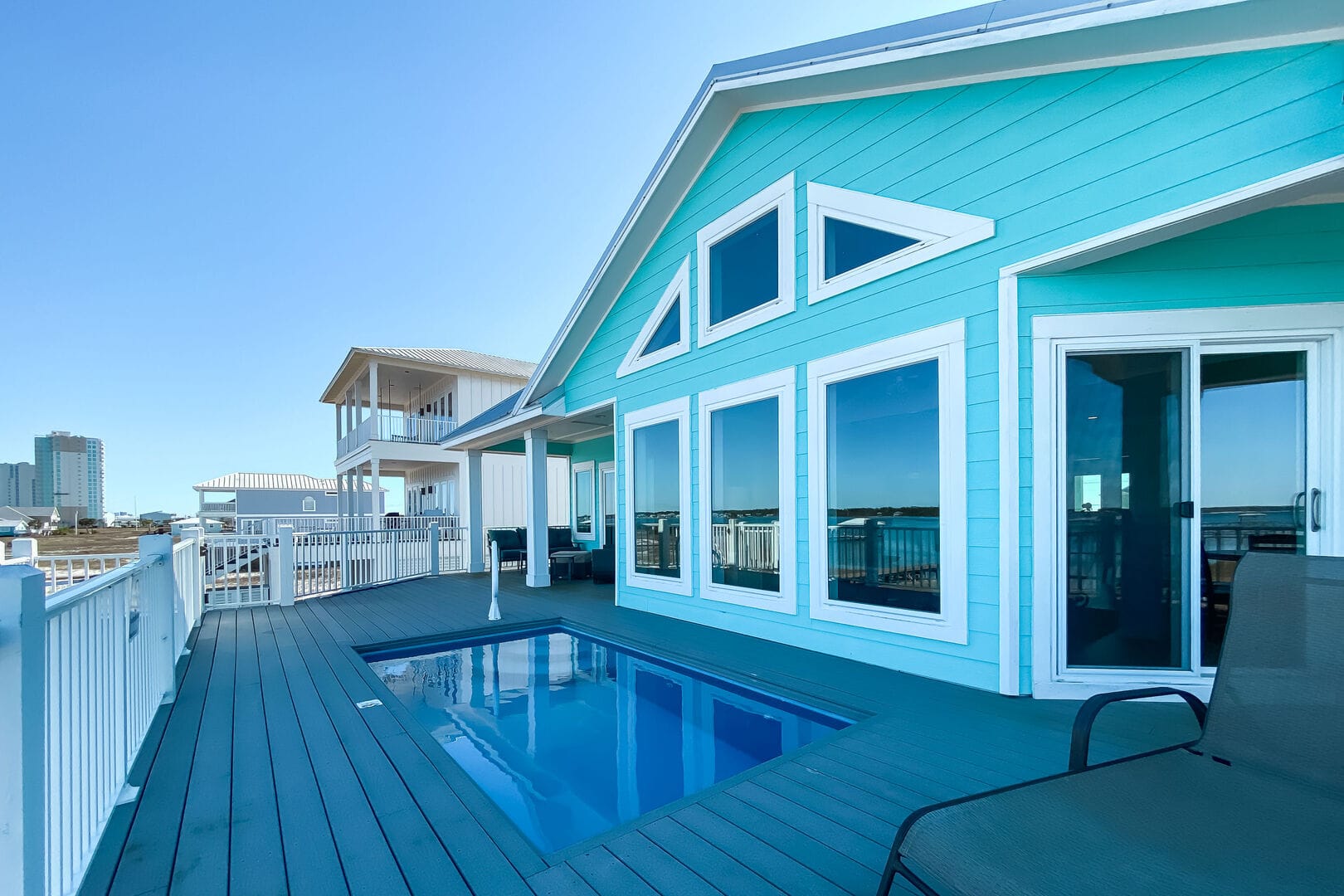 Modern house with pool and deck.