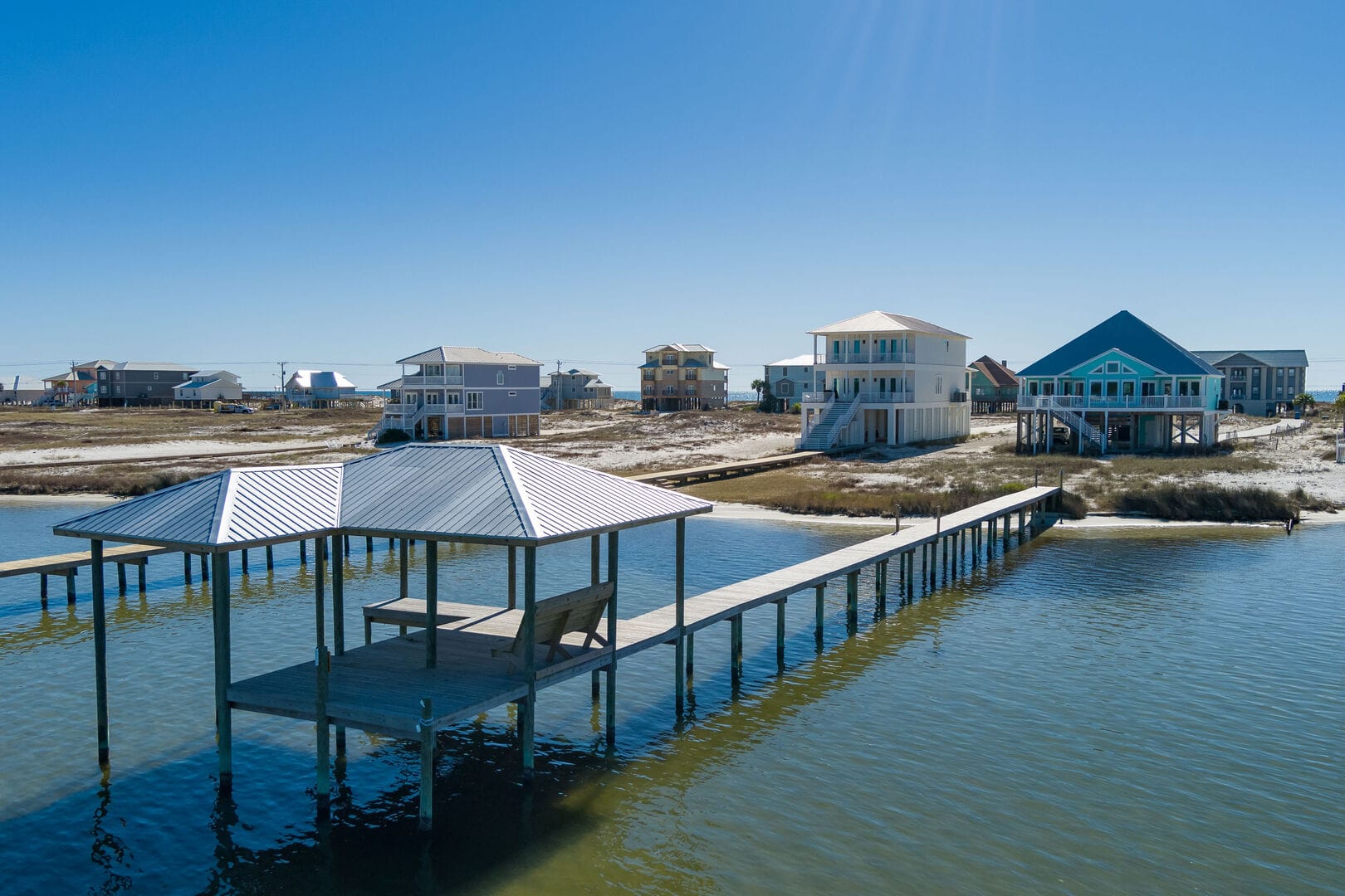 Waterfront houses with a pier.