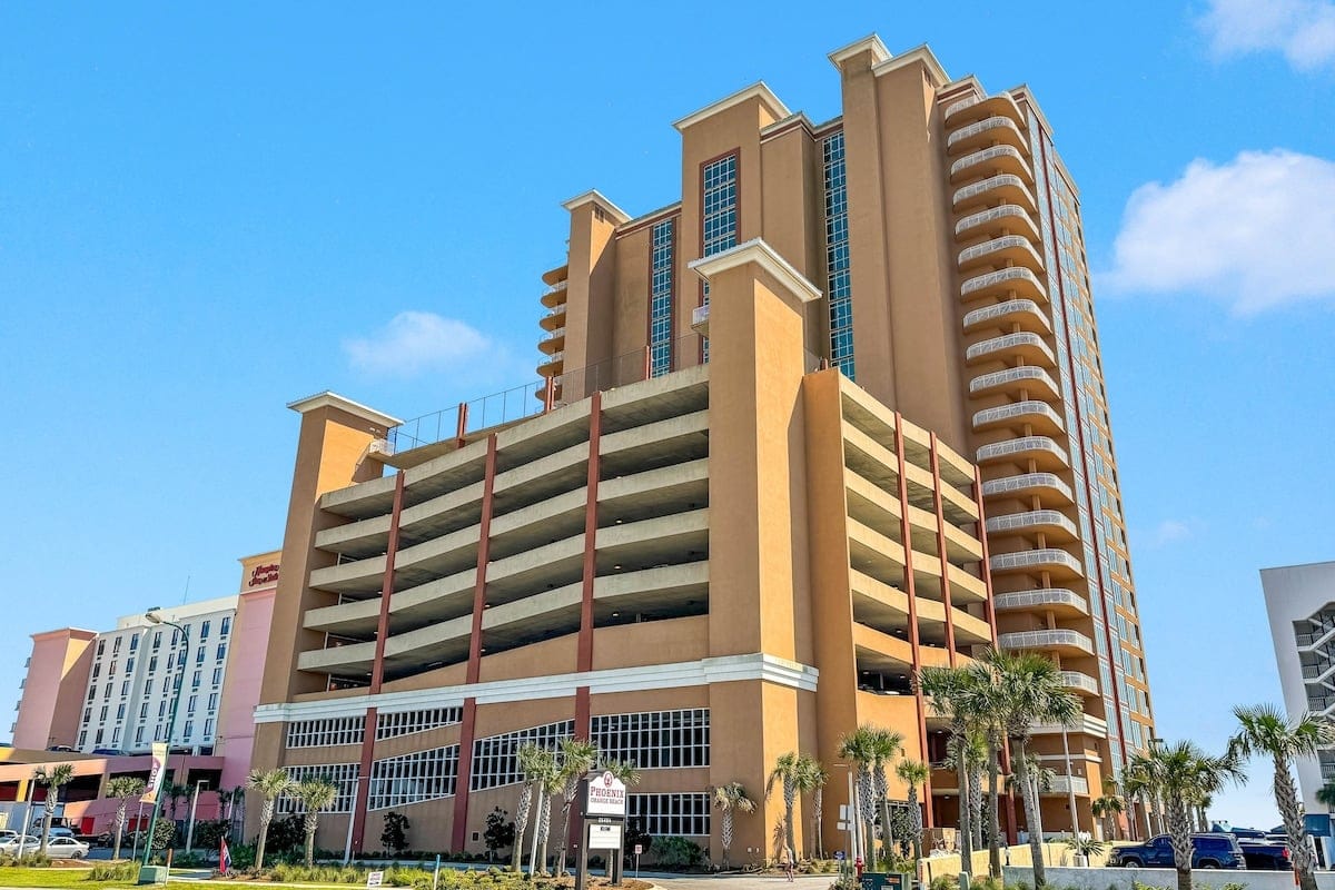 Tall building with parking structure.