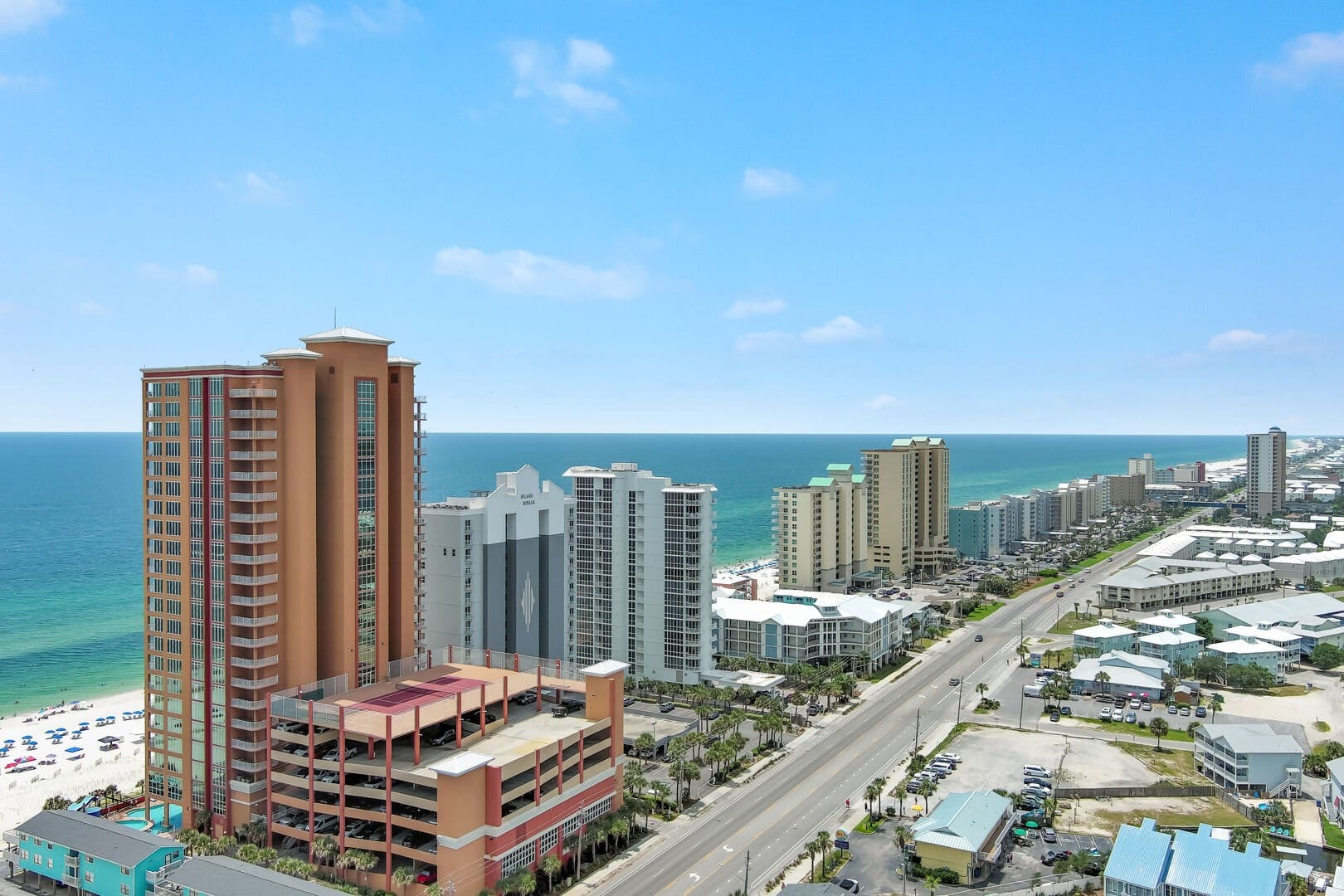 Beachfront high-rise buildings and highway.