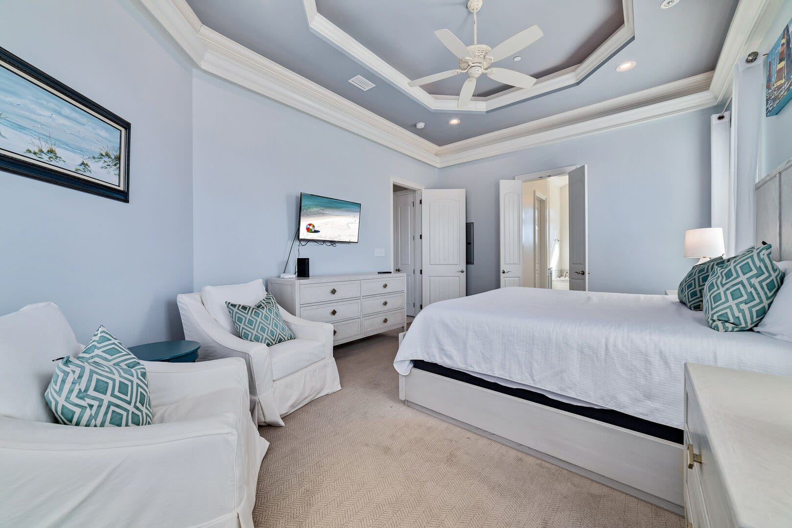 Elegant bedroom with blue accents.