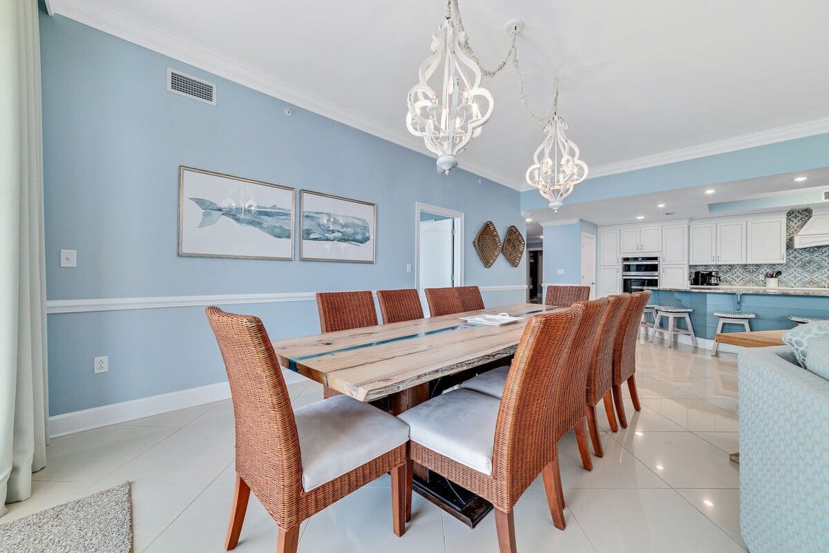 Coastal-themed dining room and kitchen.