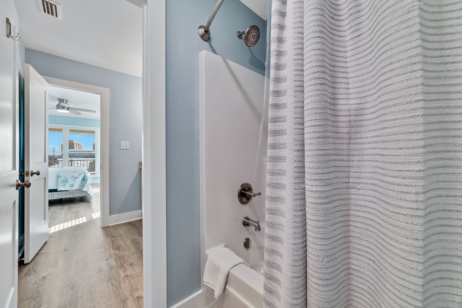 Bathroom with view into bedroom.