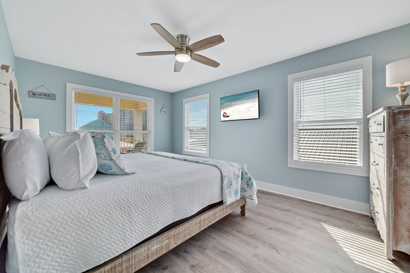 Bright bedroom with coastal decor.