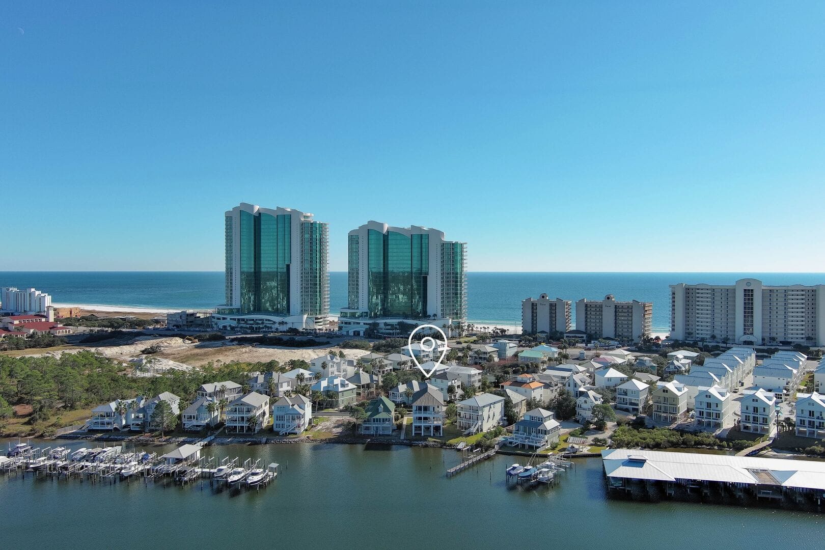 Beachfront skyline with residential buildings.