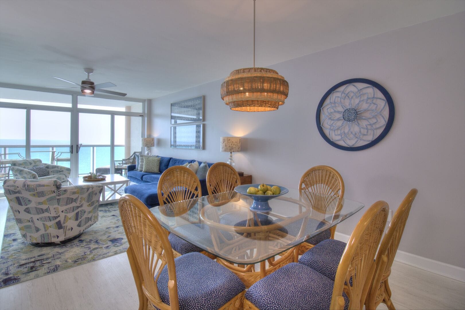 Coastal-themed living and dining area.