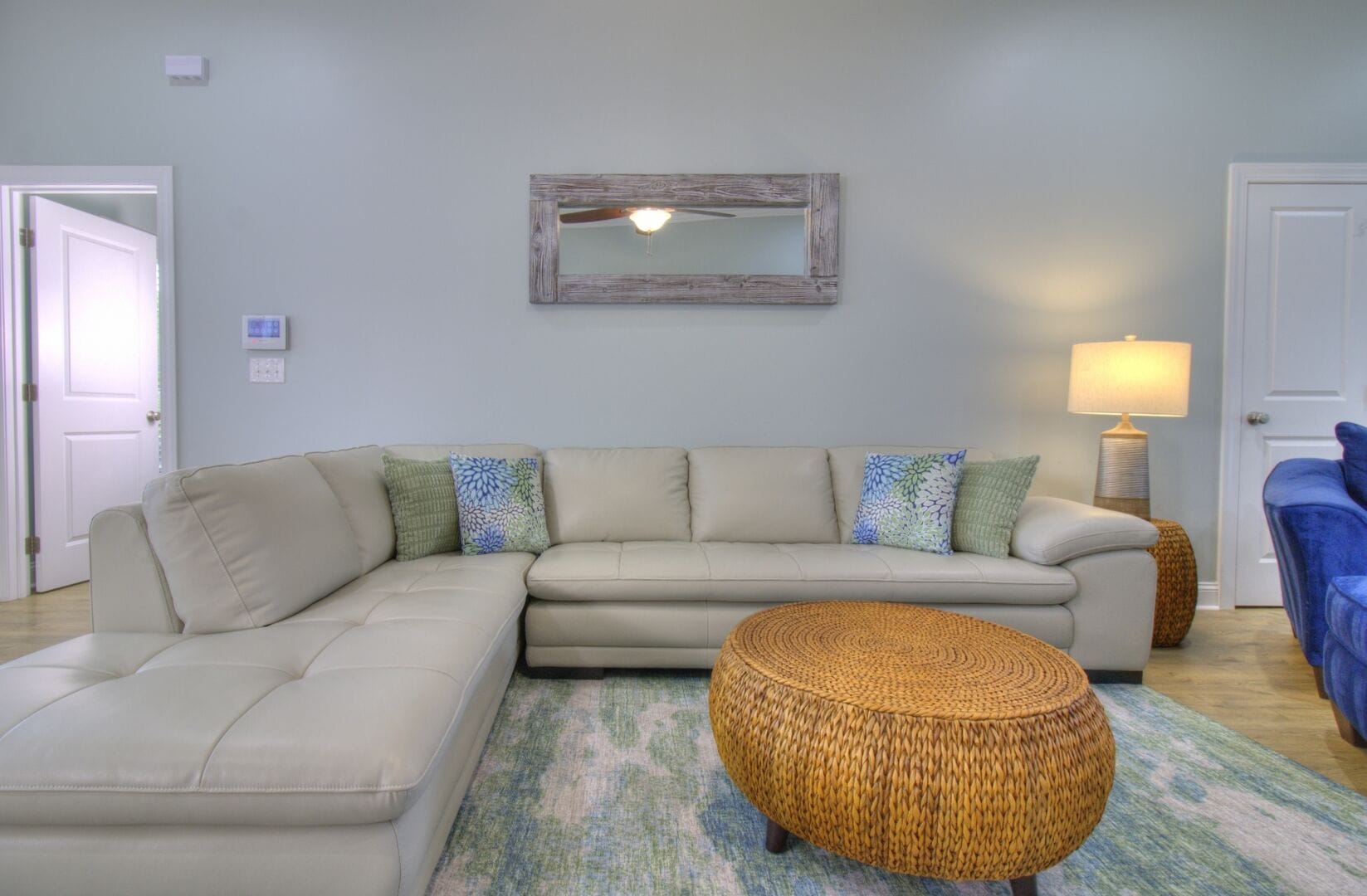 Living room with beige sofa.