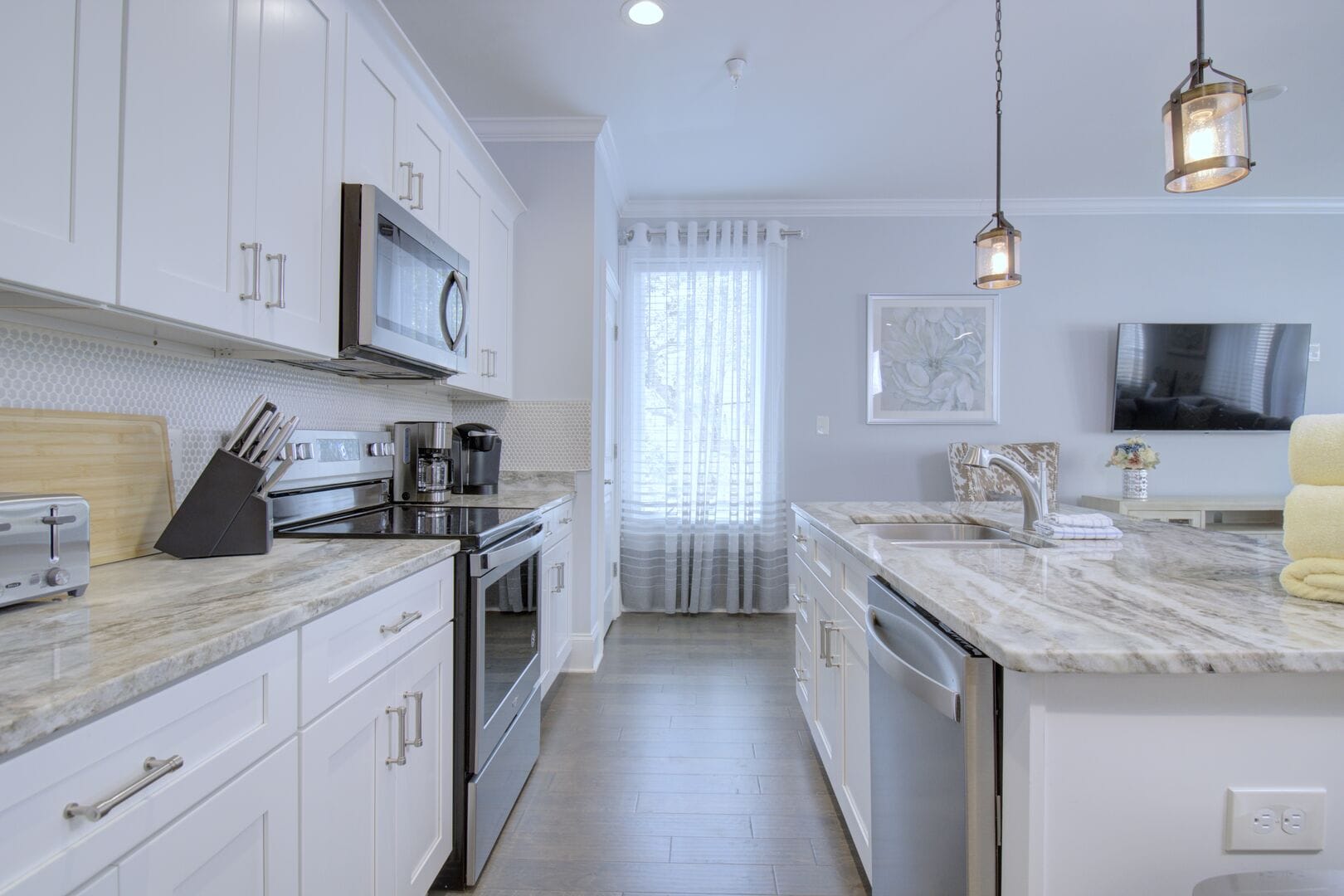 Modern kitchen with granite countertops.