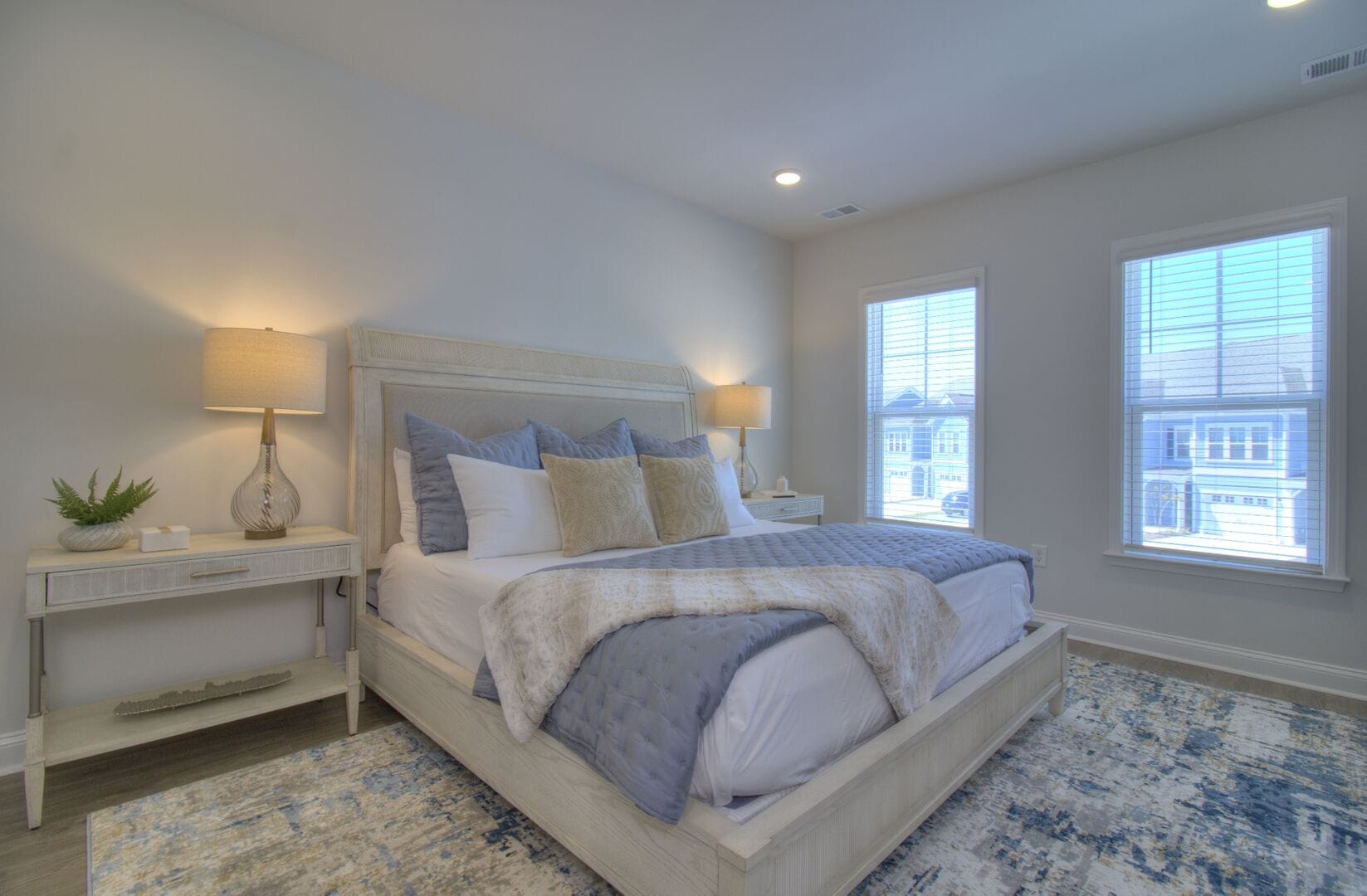 Cozy bedroom with blue accents.