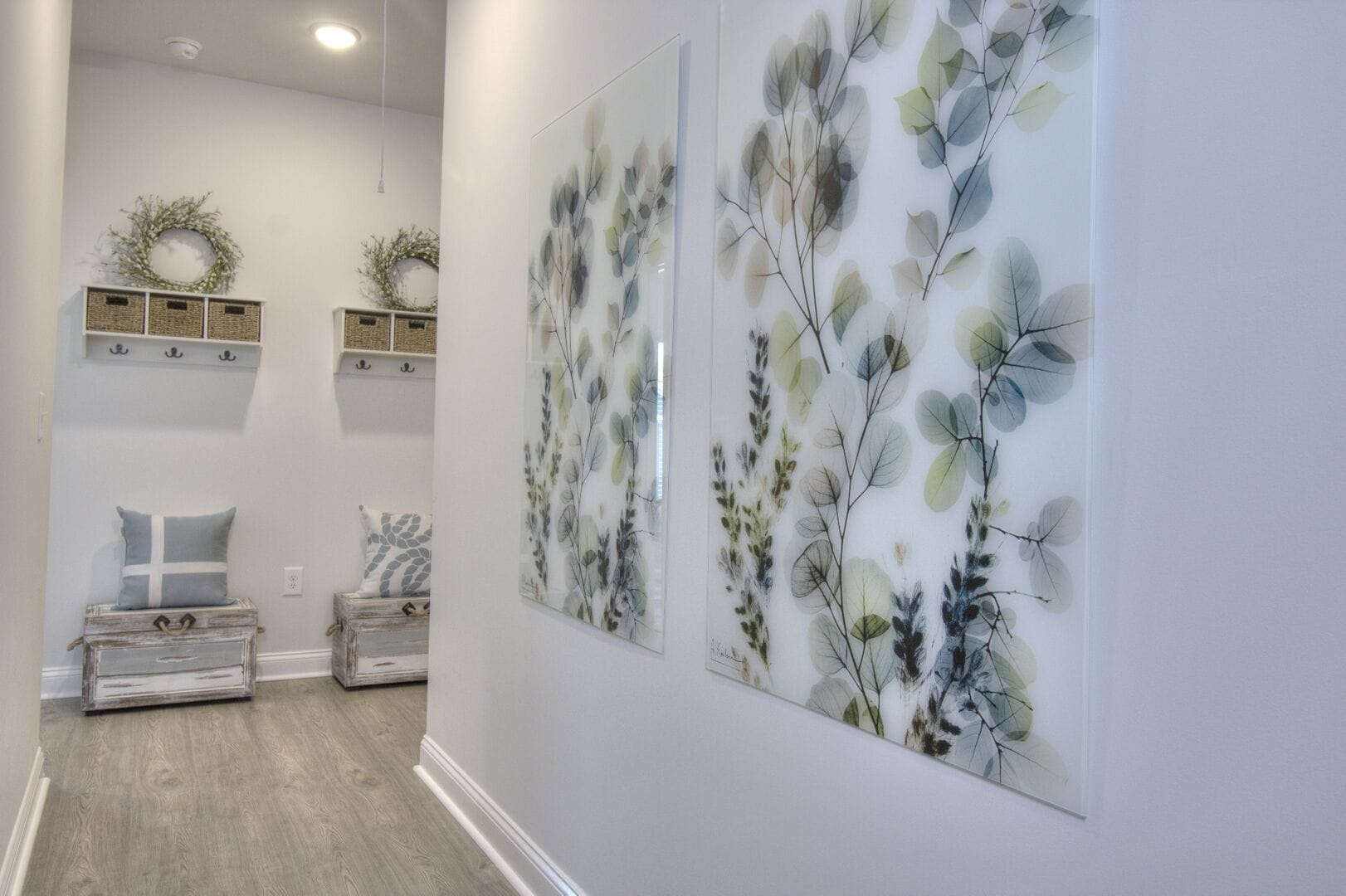 Hallway with leaf art decor.