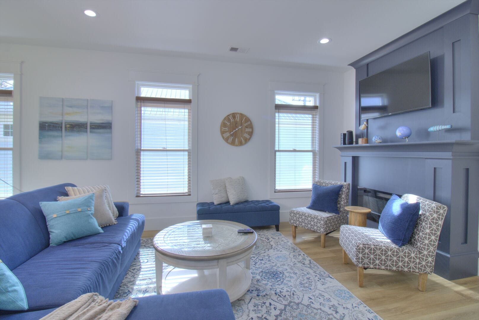 Bright living room with blue accents.