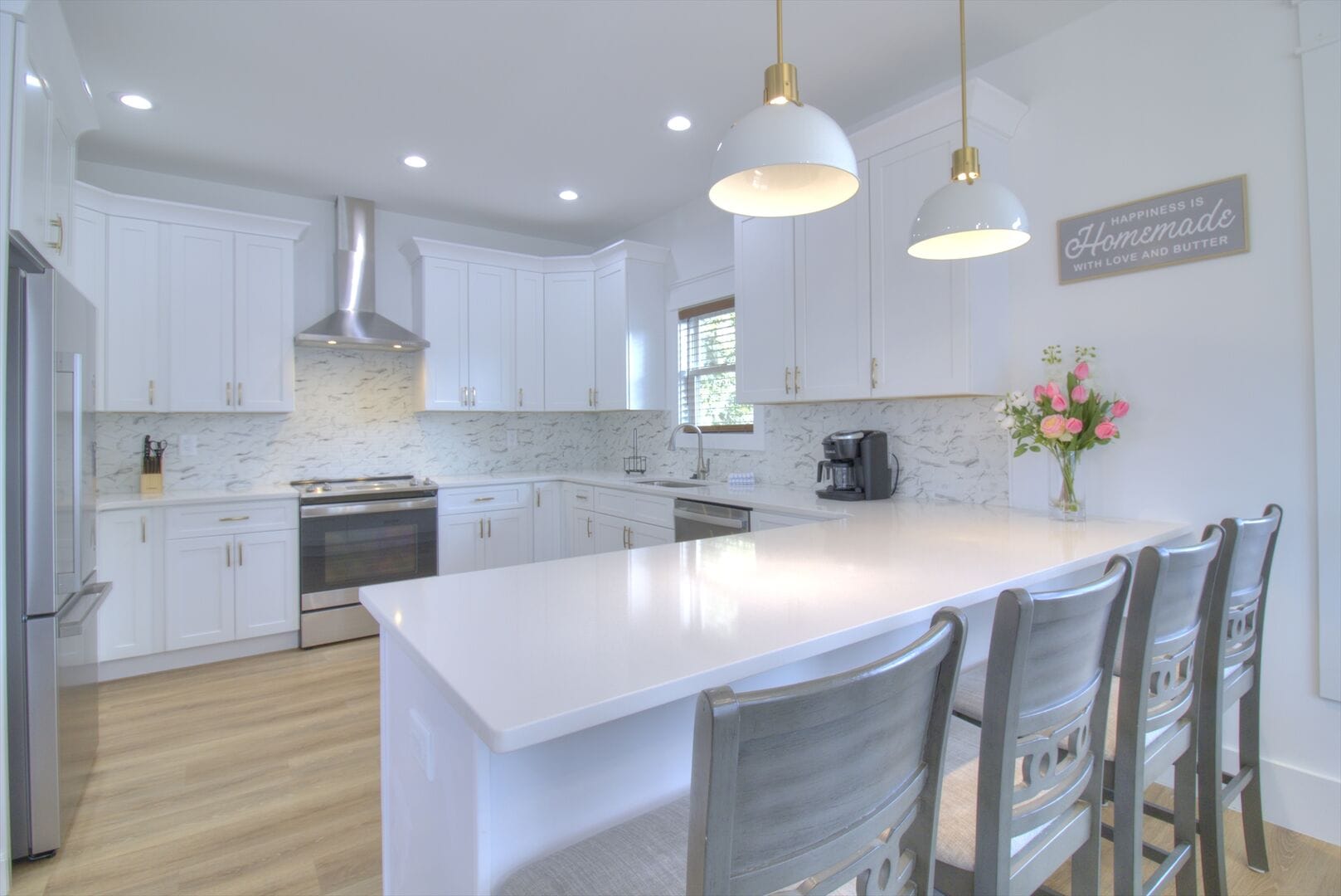 Modern white kitchen with island.