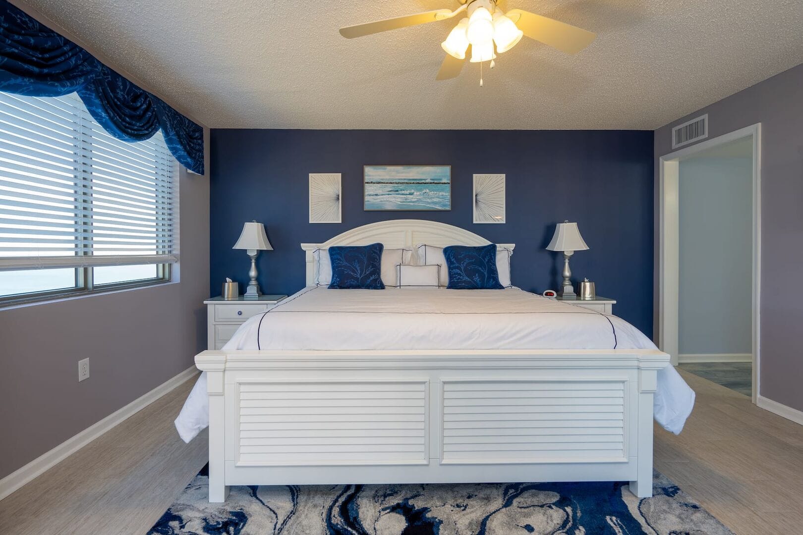 Modern bedroom with blue accents.