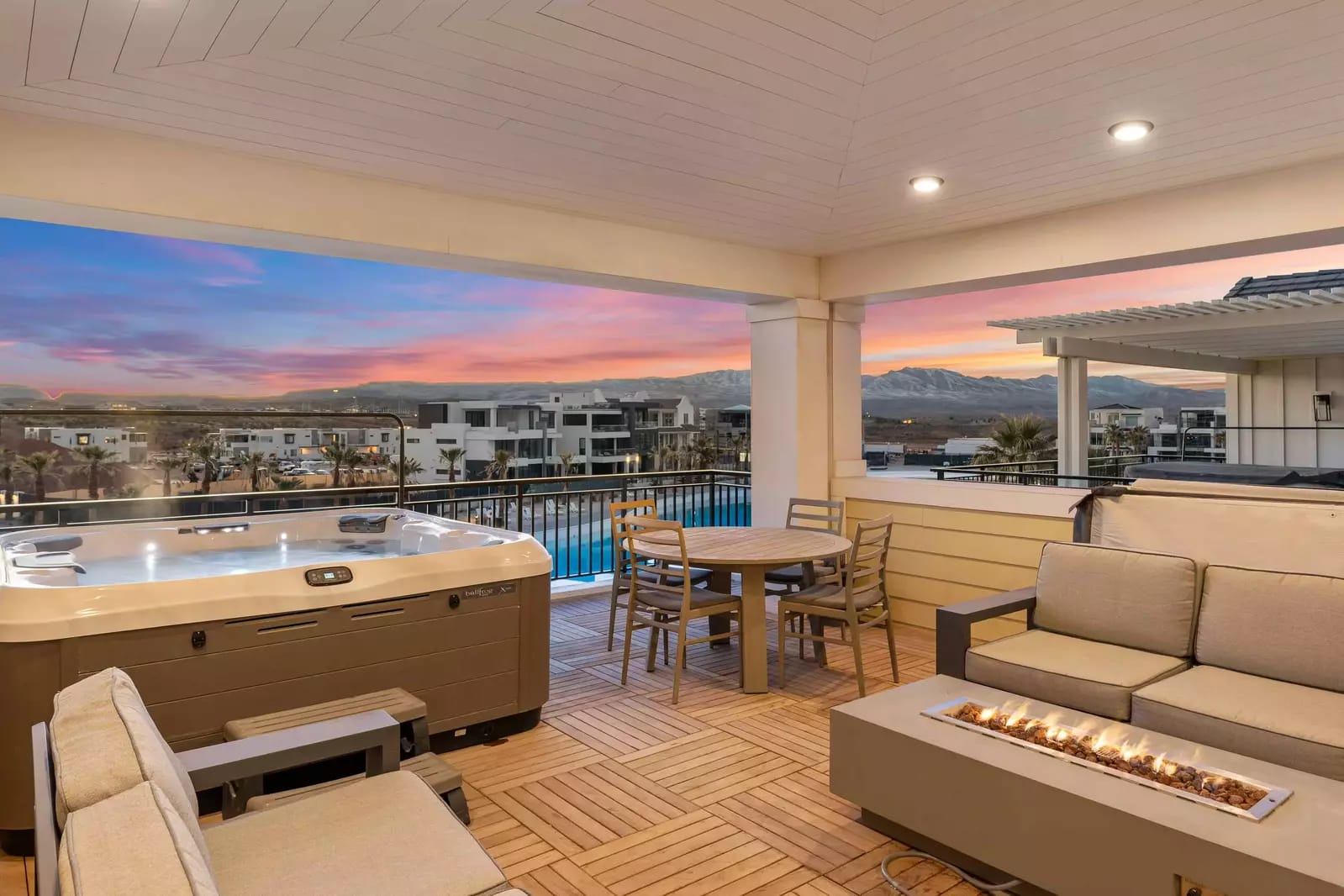 Outdoor patio with hot tub.